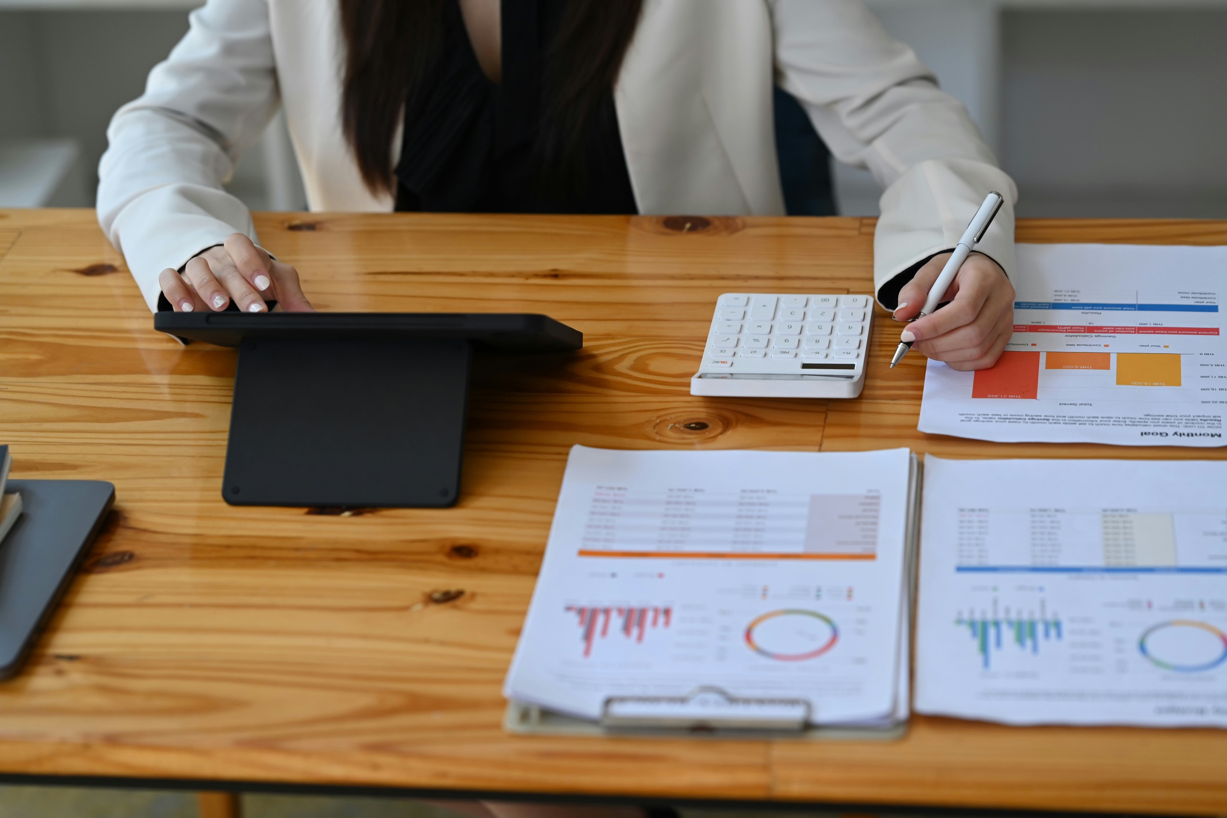 Advisors discussing investment strategy in conference room